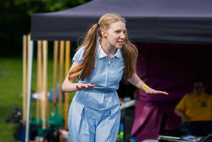 young woman performing at festival